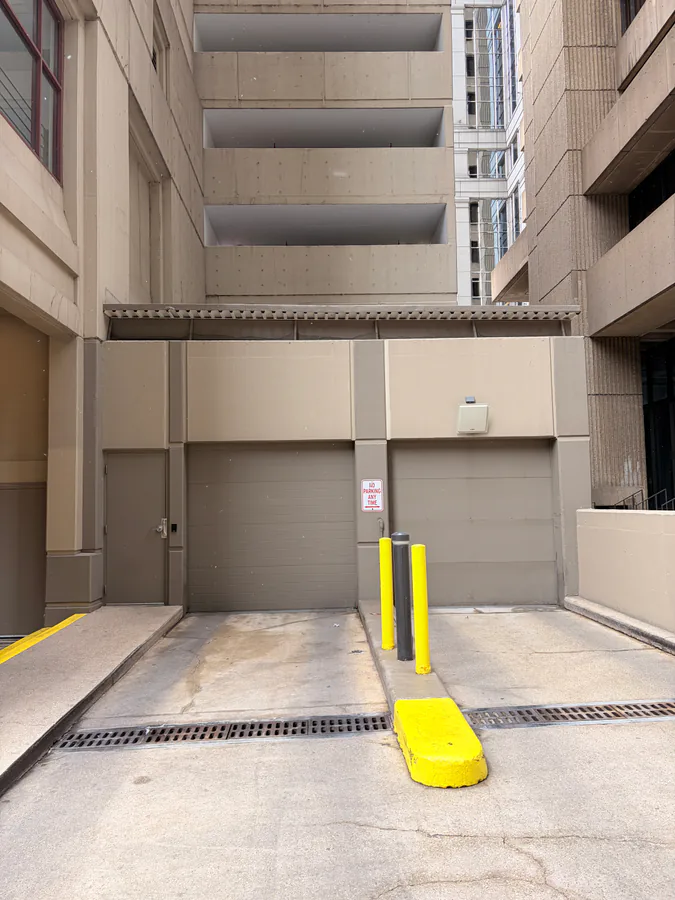 Garage gate access control with ControlID windshield-tag reader in a Chicago 50-story residential high-rise managed by a property management company