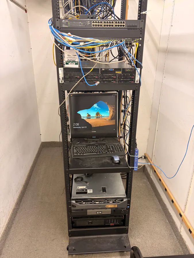 Clean, documented network rack with labeled cables and updated equipment after a Vidimost security system takeover in Chicago