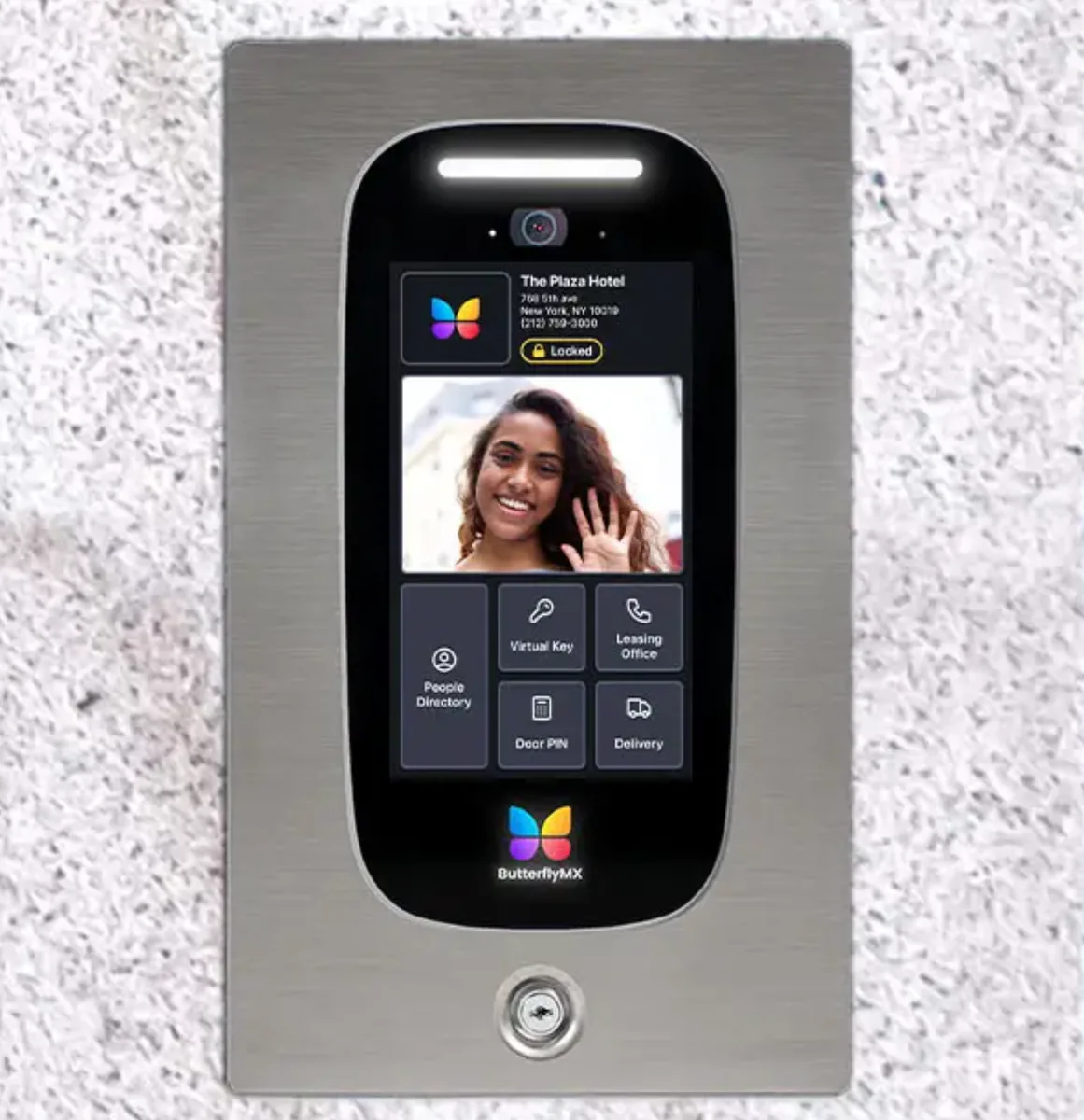 ButterflyMX 8-inch flush-mount video intercom panel installed in stainless steel trim at a condo entrance
